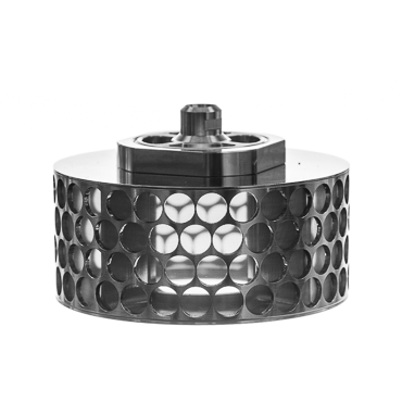 stainless steel cylinder with symmetrical perforations arranged in a honeycomb pattern, containing dark catalyst material.
